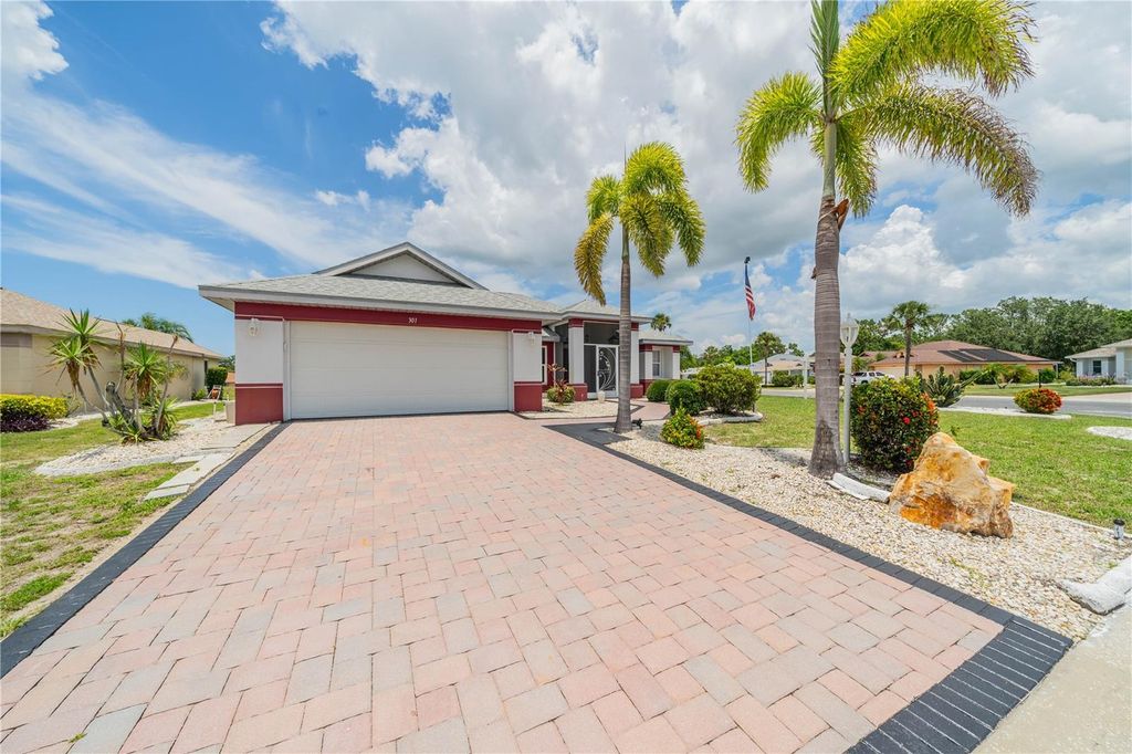 Photo of 301 Caloosa Palms Court, Sun City Center, FL 33573 (MLS # TB8483659)