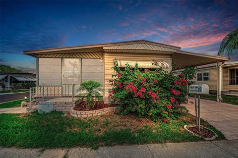 Photo of 10539 Tahitian Lane #112, Largo, FL 33773 (MLS # TB8529171)