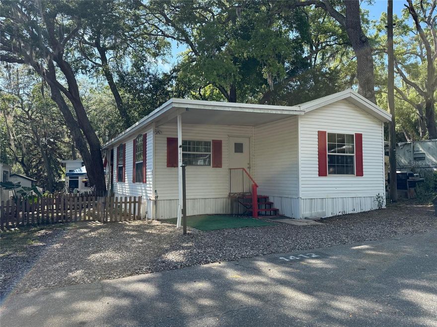 2 Bedroom 1.5 Bath Park Model Home With Florida Room Addition, Fenced In side Area And Utility Shed With Washer/Dryer Hook Ups. Rent Includes Water, Sewer, Trash Pickup, 24/7 Virtual Gatehouse, 110,000 Gallon Pool, Mini Golf, Planned Monthly Activities And Much More. Located Just Outside The West Orange Trail And Close To Bus Route, Shopping, Hospital, 30 Minutes From Disney And Cocoa Beach.