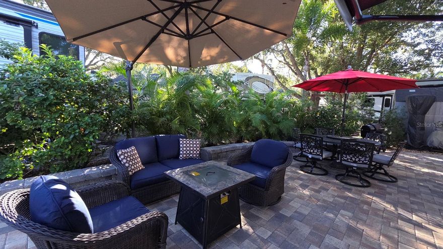 Looking for a LUXURY RV Lot to BUY in FLORIDA?  Look no further!  Welcome to River Ranch RV Resort - a Deeded RV Lot Resort where YOU own the LAND!  Enjoy Luxury and Privacy on this River Ranch Lot in Central Florida!  Lot 192 is located in PHASE II and has been updated with pavers, a full size shed, lush landscaping and lighting!  There is dedicated parking for 2 golf carts, multiple seating areas for lounging and dining and a cozy firepit area under the stars!  This lot offers shade and sun - the perfect combination!  
Looking for entertainment and fun? River Ranch offers it here!! For starters, there is a LIVE Rodeo every Saturday night – an excellent display of showmanship and fun for the entire family! There is even a Saloon (family friendly), with LIVE bands, DJs, dance parties and they give line dancing lessons for free. There is a waterpark, an adventure park which has a bounce house, mechanical bull, climbing tower, Arcade, mini golf, outside movie on the greens, bicycle rentals, airboat rides, river boat rides, swamp buggy, hayrides, petting farm, trap & skeet range and a bow target for shooting. There are several places to eat on property. The River Ranch Chop House serves delicious food and drinks, a waterfront Smokehouse Grill serving delicious BBQ, a pizza shop and an ice cream and coffee shop (serving Starbucks.) There is also a General store and a Western store to grab all of your favorite Cowboy/Cowgirl finds! Watch the Bison, Steers, Horses and other wildlife! Don’t forget to check out the Petting Farm!!