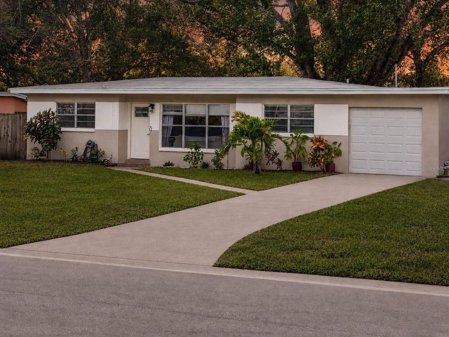 Skip the renovation stress and start living the Florida dream! Welcome to this beautifully updated 3-bedroom, 2-bathroom turnkey home in highly desirable Seminole. Perfectly positioned just minutes from stunning Gulf beaches, top-rated schools, local shopping, and the golf course, this location is hard to beat. Best of all, this home has experienced zero flooding during recent storms, giving you the ultimate peace of mind for the future.

Step inside to discover a bright, open-concept great room where a large window allows tons of natural light to flow beautifully into the main living area and kitchen. This inviting space transitions seamlessly into the upgraded kitchen, which features a large peninsula perfect for meal prep and gathering, sleek stainless steel appliances, and easy-to-maintain tile flooring. Throughout the rest of the living spaces and bedrooms, you will find gorgeous waterproof laminate flooring (installed in 2023). The entire home is 100% carpet-free, delivering a stylish, cohesive look that is a breeze to clean after a day at the beach! The thoughtfully designed split-bedroom floor plan ensures maximum privacy for the primary suite, which comes complete with its own private ensuite bath.

If you want a home that’s truly move-in ready, and this property delivers with all the big-ticket items already handled. Recent massive investments include a new HVAC system (2022), a new water heater (2023), and a beautifully remodeled guest bathroom (2023). Outside, the fully fenced backyard is an outdoor oasis ready for your personal touch, offering plenty of room to let pets run, set up a cozy fire pit, or host weekend barbecues. Complete with a one-car garage featuring built-in shelving for all your storage needs, this is a beautifully upgraded, worry-free home--Schedule your private showing today!