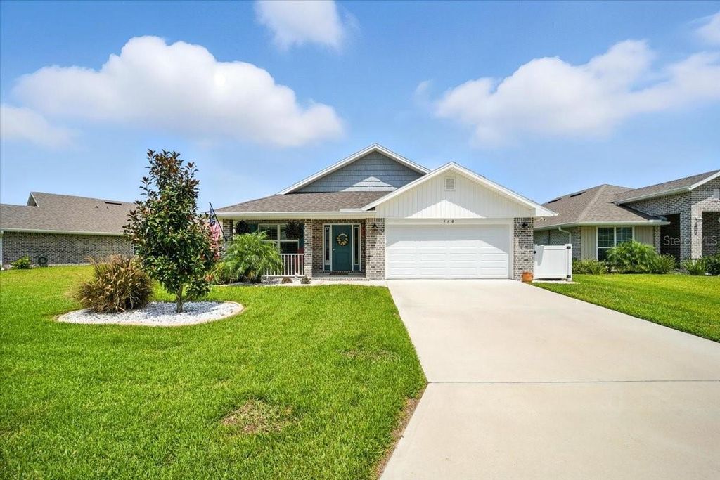 Photo of 110 Rivertown Road, Palm Coast, FL 32137 (MLS # FC312087)