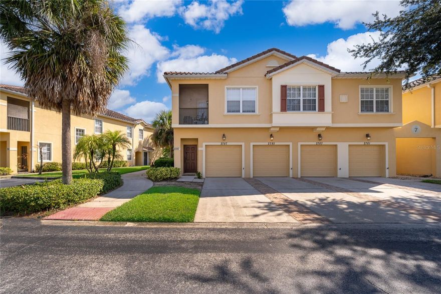 1.5 MILES TO DISNEY! This stunning fully furnished 2-bedroom, 2-bathroom condo is located in a resort-style community with top-tier amenities, including a lagoon-style pool with breathtaking lake views, tennis courts, volleyball courts, a fitness center, playground, and clubhouse. Inside, you'll find a spacious living and dining area with low-maintenance tile floors and solid-surface countertops throughout. This unit comes completely furnished and includes all appliances plus a fully equipped kitchen with a breakfast bar for additional seating, perfect for casual dining. Enjoy Florida’s beautiful weather from your screen-enclosed, covered patio. For added convenience and security, this condo also features a one-car attached garage with an electric garage door opener. Located just minutes from the most popular attractions in Kissimmee/Orlando, you are literally at Disney’s gates! Plus, shopping at outlet malls, dining, and entertainment are within 15-20 minutes, and Orlando International Airport is only 25 minutes away. This is an incredible investment opportunity! The condo is currently in a highly successful rental program with strong bookings in place, but there is no obligation to remain with the property management company. Whether you choose to live here year-round, reserve it for your personal vacations, or rent it out when not in use, the choice is yours! Don’t miss out on this fantastic opportunity contact me today for a private showing!