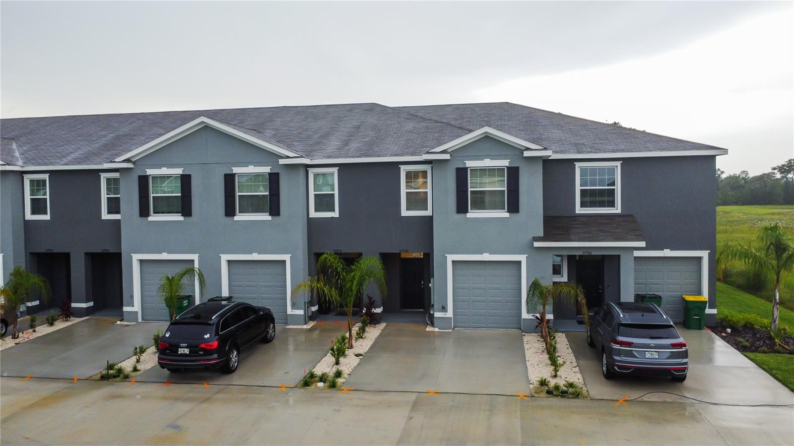 Now available is this brand new 3 bedroom 3 bathroom townhome in Wesley Chapel. Comprised of just under 1700 sq ft, this property has many stunning features such as stainless steel appliances, solid surface countertops throughout the home, and solid wood cabinets in the kitchen!!! Tile flooring is featured throughout the downstairs living area. Upstairs you will find not only the master bedroom but all additional guestrooms as well. In addition to all of this, 32972 Major Oak Drive also features a washer/dryer and a 1 car garage!!!