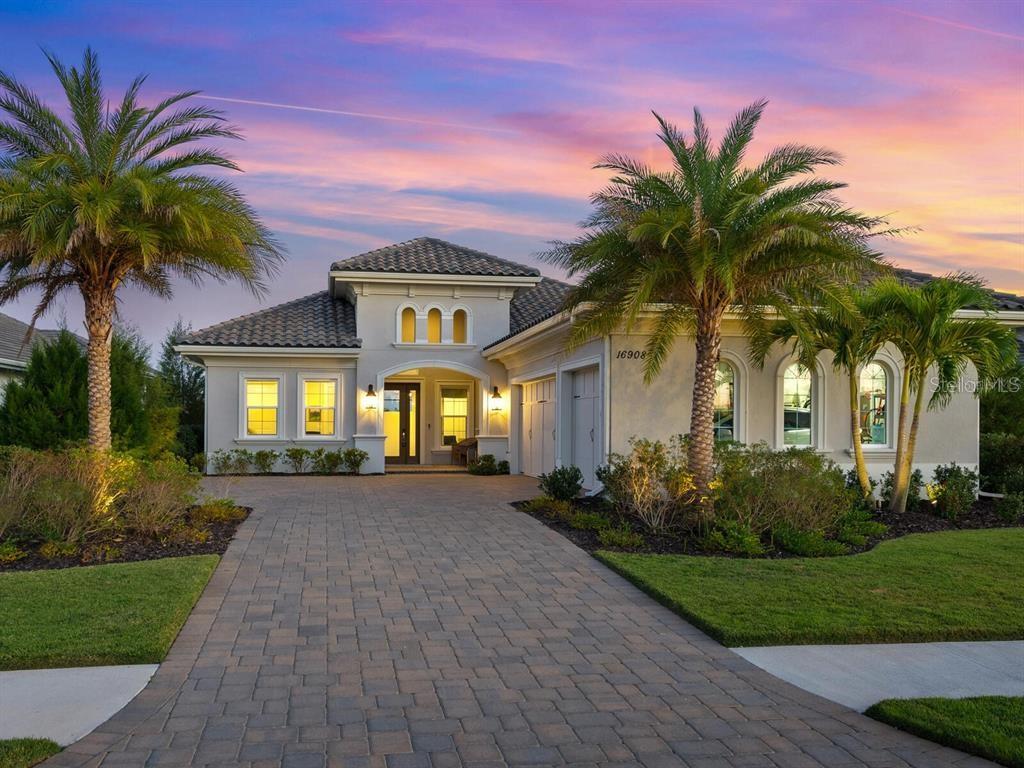 Under Construction. Rare opportunity to purchase a BRAND NEW, never occupied, Mayfield III model home, 3,033-SF, 4bd, 3.5 bath, great room, dining room, kitchen nook, study, laundry room, dry bar with wine refrig, new appliances, 3-car garage, on a premium lot, in The Lake Club, a private gated community in Lakewood Ranch. Incredible outdoor living includes a custom gas heated saltwater pool/spa, complete outdoor kitchen, and panoramic screened lanai to maximize your Western water exposure and amazing sunset views! 6ft interior spa flush to deck with 360 degree spillover and 8 waterway jets. Pool features an extended swimout bench, extended entry steps and 6ft sheer descent waterfall. No options or upgrades spared. Crown molding and luxury vinyl floor tiles throughout. Upgraded cabinets, countertops and baseboards. Hurricane impact windows and doors. The Lake Club’s abundant amenities include a newly renovated Grande Clubhouse, restaurant, resort-style pool, fitness center, tennis courts, pickleball, playground, Linear Park and interlinking lakes for kayaking and fishing. Available for early June closing and quick move-in.