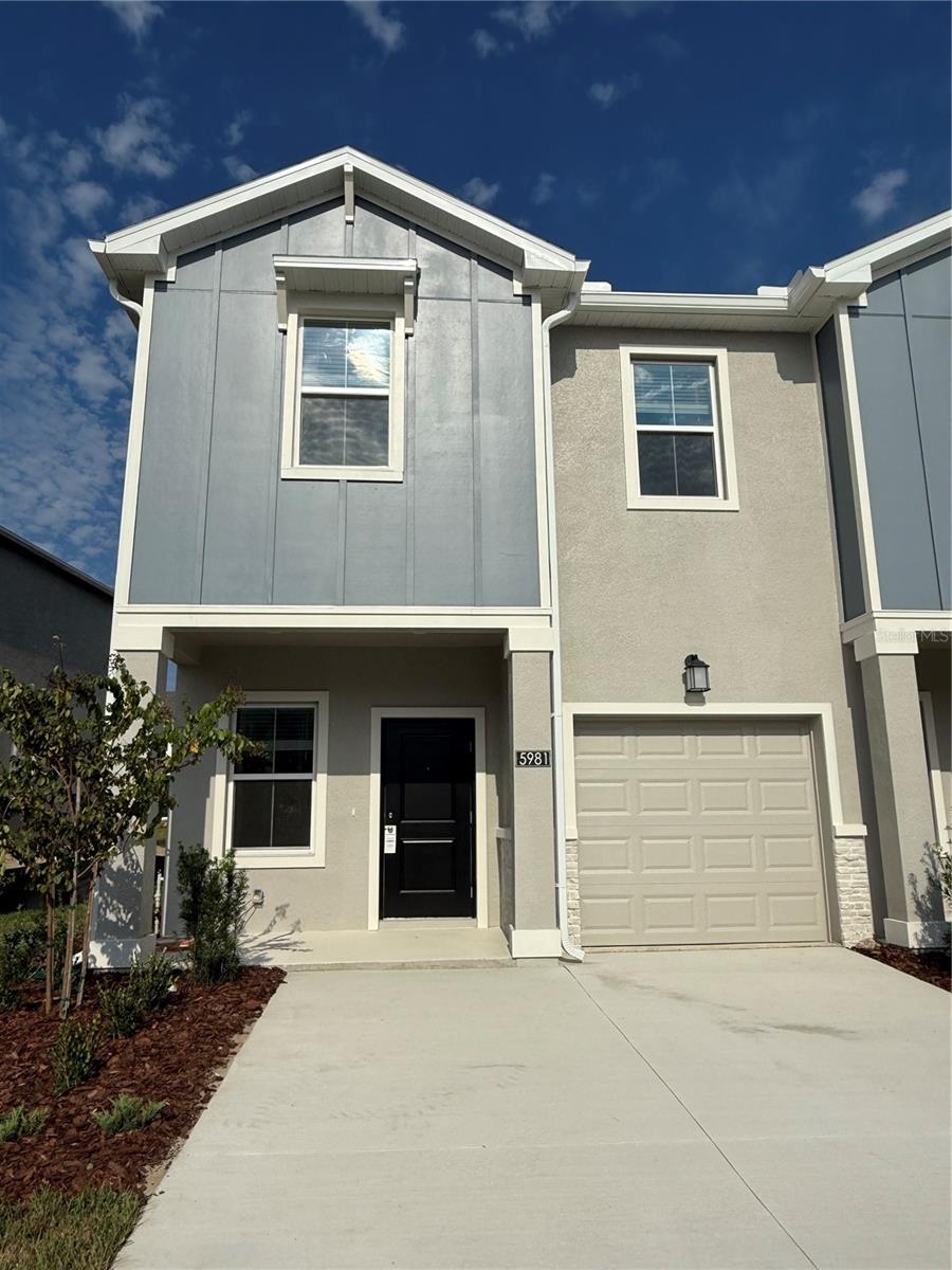 ***BRAND NEW TOWNHOME FOR RENTAL*** Corner Lot in Desirable Wellness Ridge Community! Located in the growing city of Clermont, this luxurious 3-bedroom, 2.5-bathroom townhome offers modern living at its finest. Spacious two-story layout with an attached one-car garage.. Thoughtfully designed for flexibility and comfort, this townhome boasts high-end finishes throughout. Open-concept floor plan, with the dining area flowing seamlessly into a generous family/living room and a modern kitchen. The kitchen features quartz countertops, stainless steel appliances. Ceramic tile flows throughout the first floor.. Upstairs, you'll find the master suite, complete with a walk-in closet and a en-suite bathroom with a dual vanity and a glass-enclosed walk-in shower. Two additional bedrooms with spacious closets. A large loft space provides endless possibilities for a home office, play room, or additional living area. Additional features include a brand-new washer and dryer in the dedicated laundry room, doble panel windows and concrete block construction throughout. High-speed internet and lawn maintenance included in your rent.. This townhome is perfectly located for easy access to SR 429, Highway 27, SR 50 and major roadways, placing you just 10 minutes from Winter Garden and Hamlin, 30 minutes from Disney World, and 40 minutes from Universal Studios. Close to Advent Health Hospital, Orlando Health Hospital. You will enjoy soon exclusive access to a resort-style clubhouse, a playground, fitness center, swimming pool, tennis, basketball, and pickleball courts. The community is across from Lake Louisa State Park that offers endless activities like biking, boating, fishing, camping, and hiking. Plus, the community is nearby the under construction future Olympic Stadium. Don't miss your chance to experience this beautiful townhome in a prime location with incredible amenities. Contact us today to schedule your tour!