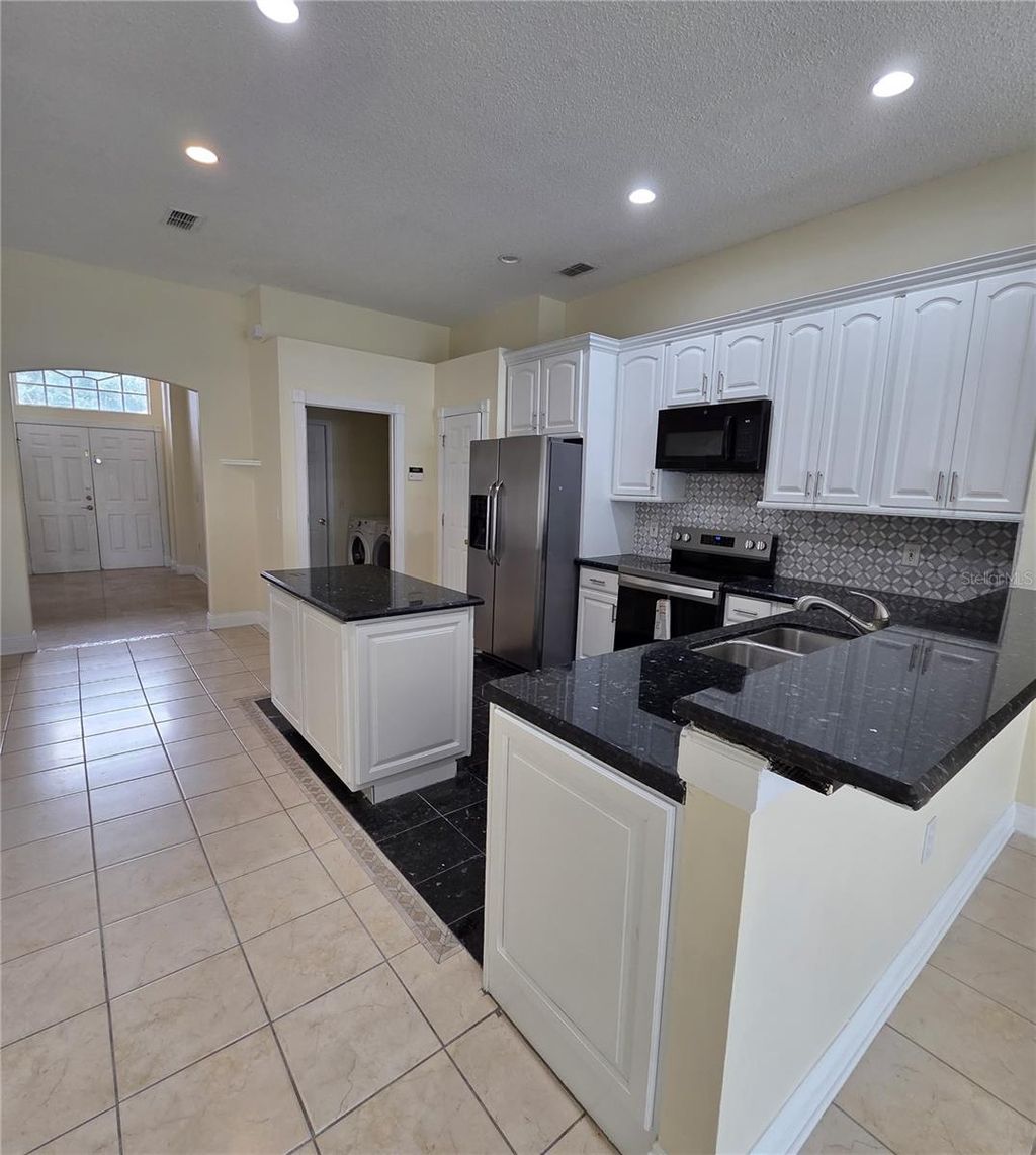 Photo of 218 Cornwallis Drive, Davenport, FL 33897 (MLS # O6343729)