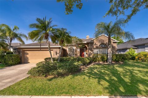 Photo of 402 Turnstone Way, Orlando, FL 32828 (MLS # O6277991)