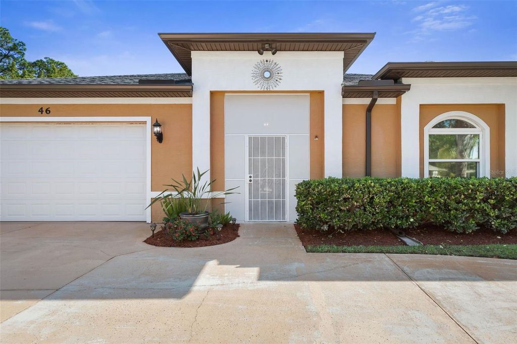 Photo of 46 Boxwood Ln, Palm Coast, FL 32137 (MLS # FC313884)