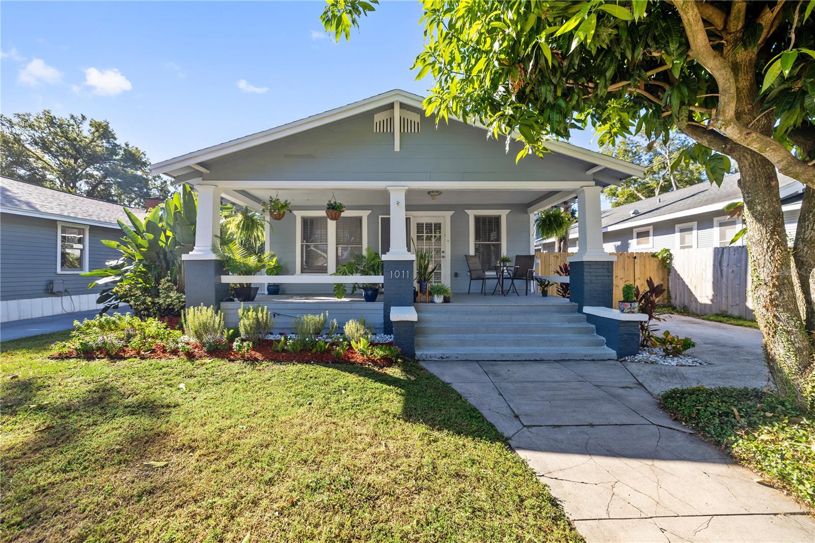 Step into the perfect blend of historic charm and modern comfort with this completely remodeled 1925 bungalow. Ideally situated in Southeast Seminole Heights, this home’s dazzling character and spacious front porch welcome you into a bright and beautifully updated 3-bedroom, 1-bath retreat. Inside, you’ll find an all-new kitchen featuring sleek cabinetry, modern countertops, and stainless steel appliances. The bathroom has been stylishly refreshed, complemented by new flooring throughout and a cozy working fireplace that anchors the living space with timeless warmth. The backyard offers endless possibilities, perfect for entertaining, gardening, or simply enjoying quiet Florida evenings. Experience the best of historic Tampa living with classic character, modern updates, and an unbeatable location all in one move-in-ready home. Just minutes from Downtown Tampa, Channelside, and Armature Works, and a short stroll to local favorites like craft breweries, restaurants, and coffee shops, this home places you right in the heart of it all, and best of all, it’s not located in a flood zone.