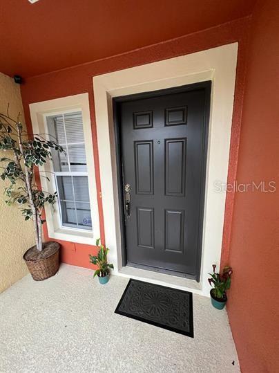 Welcome to this beautifully maintained townhouse built in 2006, located in the desirable community of Orlando. This spacious 2-bedroom, 2.5-bathroom home offers 1,303 square feet of comfortable living space. The layout features two generously sized master suites, a convenient half bathroom on the main floor, and an open-concept living and dining area perfect for entertaining. Don't miss the opportunity to own this charming home close to shopping, dining, major highways, and entertainment options!