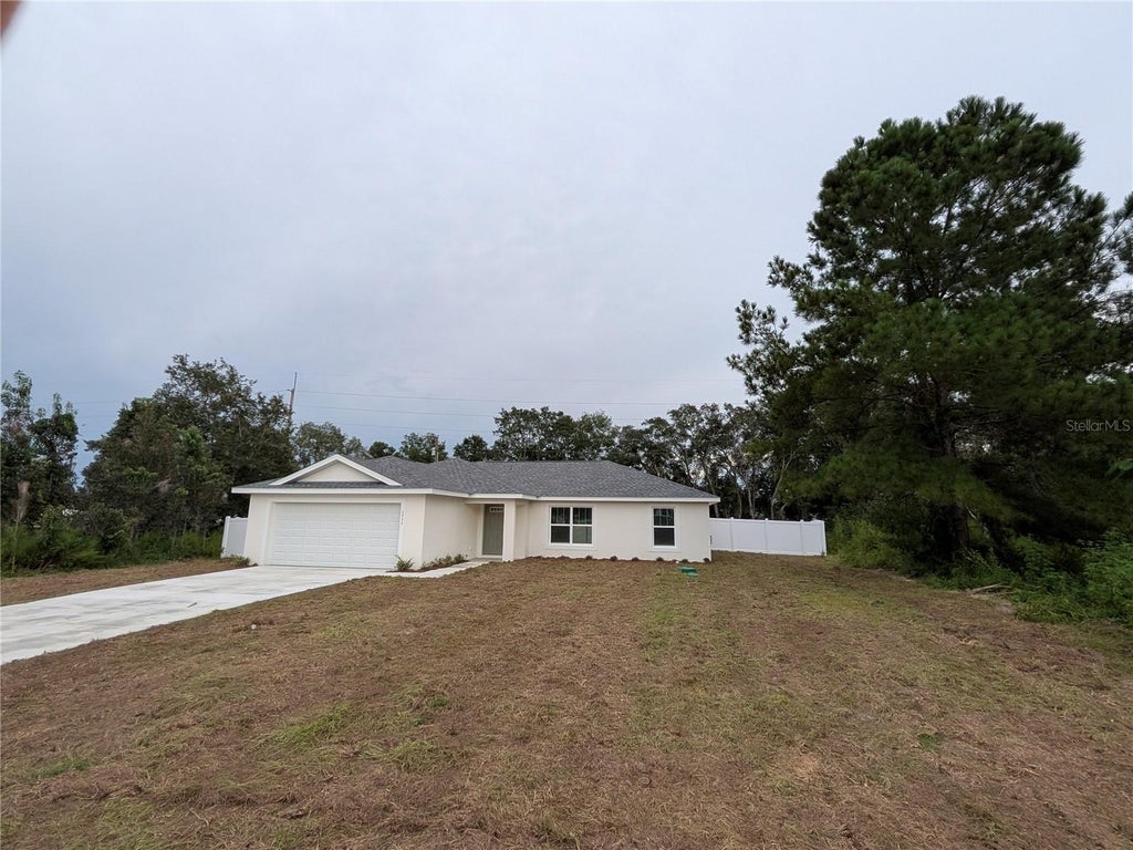 Photo of 4846 SW 143rd Loop, Ocala, FL 34473 (MLS # O6436315)