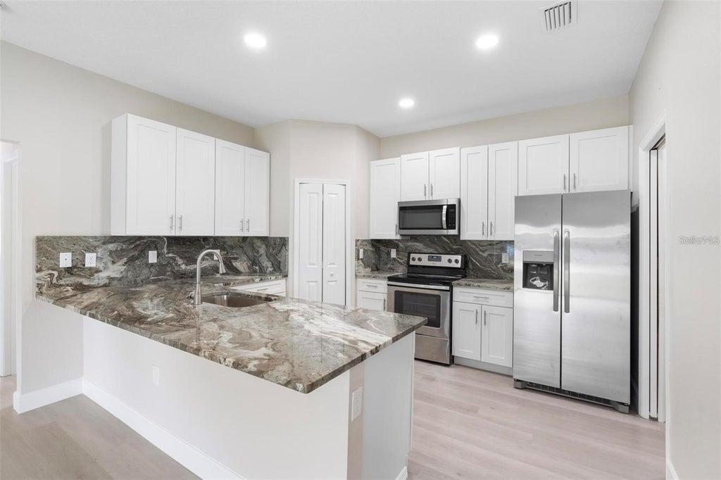 Photo of 1201 W 9th Street, Sanford, FL 32771 (MLS # O6416721)
