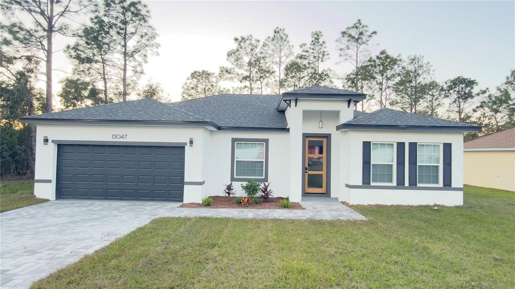 Photo of 13047 SW 79th Circle, Ocala, FL 34473 (MLS # O6358464)