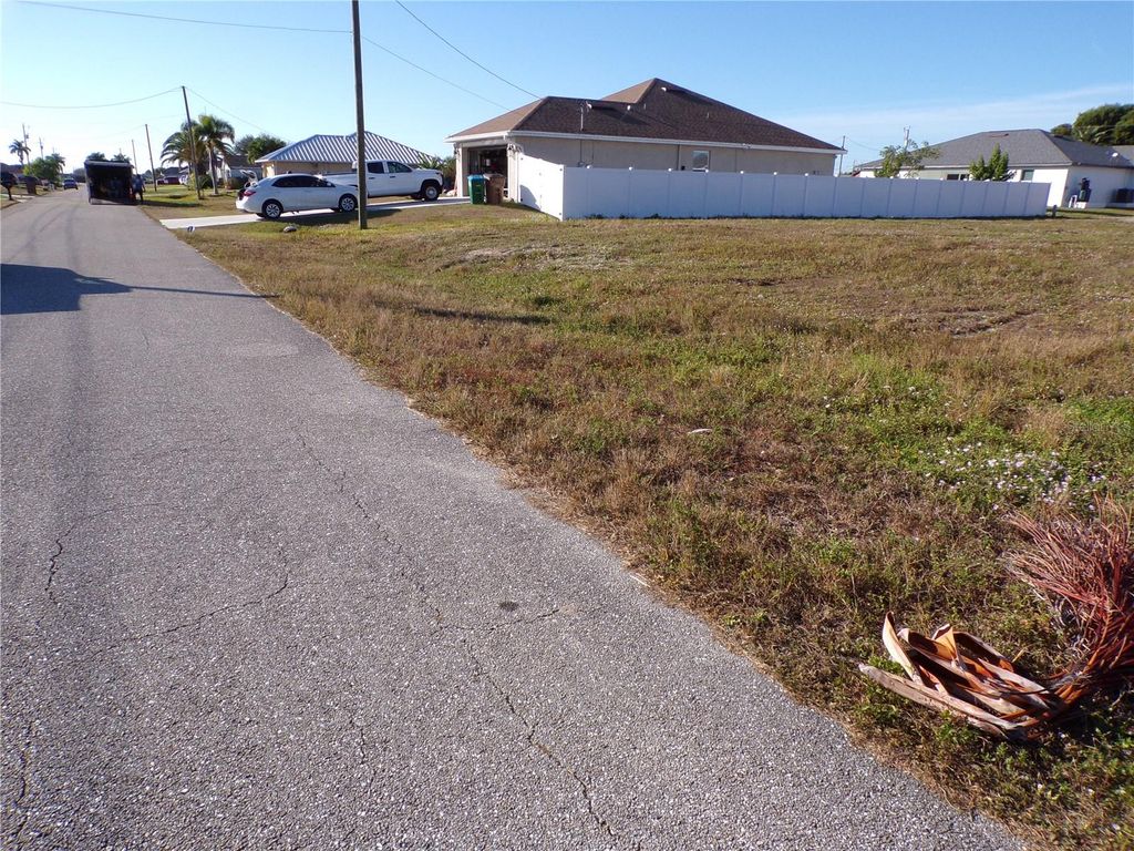 Photo of 105 NW 9th Terrace, Cape Coral, FL 33993 (MLS # C7519493)