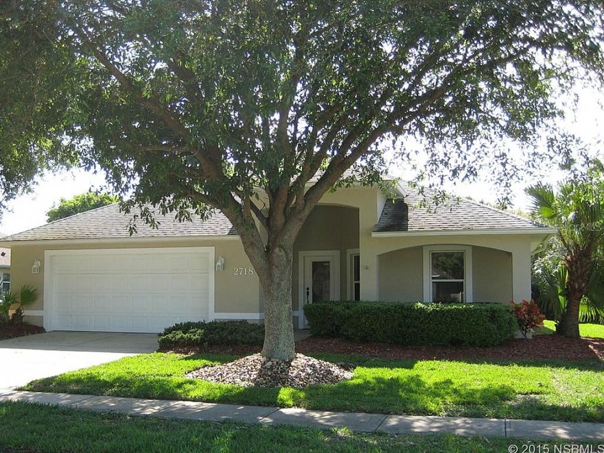 This lovely 3 Bedroom/2 Bath Home built by the Johnson Group in 2000 is located in the friendly neighborhood of Turnbull Estates, where the living is all about enjoying the good life. With over 2,400 total sq. feet, what isn't to love about this home?  Upon entering the glass front door, the foyer welcomes you into a spacious open floor plan with a completely modern kitchen at the heart of the home that includes stainless steel appliances, natural gas range, skylight, breakfast bar, pantry, tiled backsplash and countertops.  Lovely formal dining room w/new wood laminate flooring. The light filled, spacious living room has volume ceilings, display shelves, large tiled floor and two sliding doors that lead to an L-shaped lanai, the perfect place for outdoor entertaining.  Added in 2012, the screened porch features a refreshing saltwater pool, lots of deck area, cable for TV and a gas hookup for the grill.  There's a natural buffer between the backyard and the golf course offering privacy, or you can trim the shrubbery to enjoy a golf course view.   Back inside, double doors lead into the Master Bedroom with an extra large walk-in closet and ensuite bath with double sink vanity and walk-in shower. Other interior features include two large guest bedrooms, an inside laundry room w/natural gas dryer & laundry sink, ceiling fans, and safe room. Oversize 2-car garage w/natural gas water heater is large enough to hold all your toys. Running through the community is The Preserve at Turnbull Bay, a family owned and operated 18 Hole Golf Course with a full size driving range and practice facility open to the public daily.  Unbelievable low HOA fee of only $197.00/year. ;Water: City