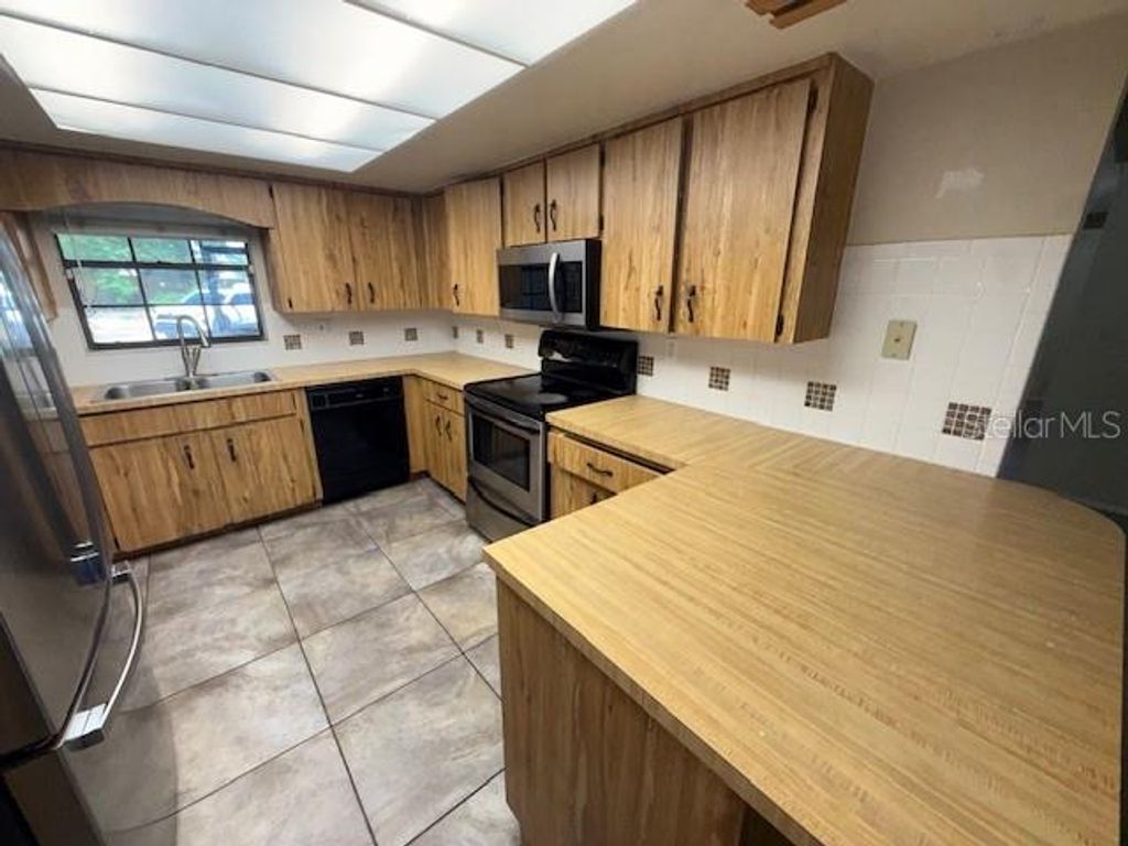 Photo of 850 Lake Elbert Park NE Park, Winter Haven, FL 33881 (MLS # S5148051)