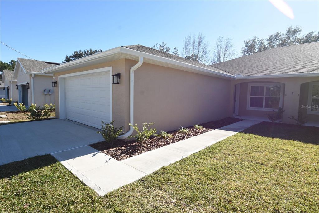 Photo of 11 Buttonwood Lane #A, Palm Coast, FL 32137 (MLS # FC316017)