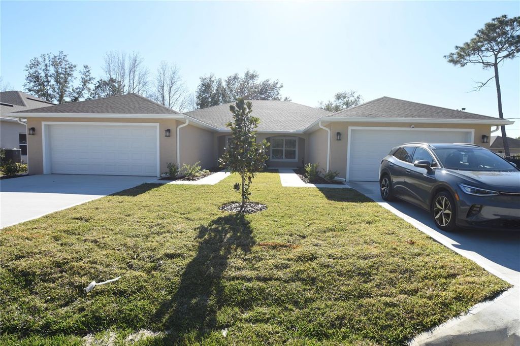 Photo of 11 Buttonwood Lane #A, Palm Coast, FL 32137 (MLS # FC316017)