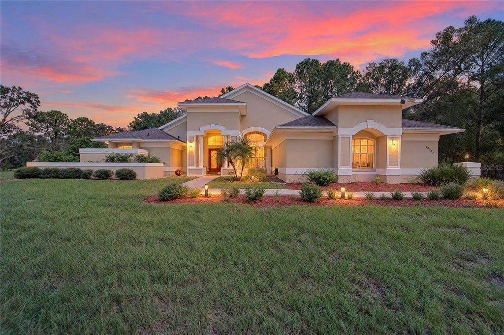 Photo of 28329 Lindenhurst Drive, Wesley Chapel, FL 33544 (MLS # TB8558044)