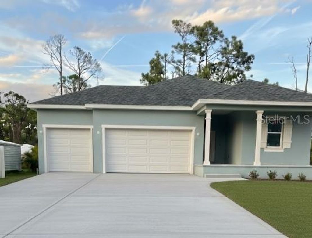 Photo of 12094 Chapman Avenue, Port Charlotte, FL 33953 (MLS # L4958887)