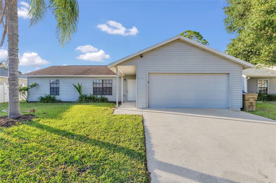 Welcome to this move-in-ready 3-bedroom, 2-bathroom home with a 2-car garage and over 1,200 sq. ft. of living space, located in the sought-after Poinciana Villages community. With a low monthly HOA fee and a host of neighborhood amenities, this home delivers both value and comfort. From the moment you arrive, you’ll notice the well-maintained landscaping with a beautiful palm tree that adds to the home’s great curb appeal. Step inside to a spacious living room that flows easily into the dining area, where sliding glass doors open to a back patio, extending your living space outdoors. The kitchen features stainless steel appliances, shaker-style cabinetry, and a pass-through window that connects to the dining room—perfect for entertaining or casual meals. The primary bedroom offers a private ensuite bathroom with a single vanity and a subway-tiled shower/tub combo, ideal for relaxing at the end of the day. A sliding glass door provides direct access to the outside patio area. The home offers two additional bedrooms, each with walk-in closets, and a guest bathroom with a matching single vanity and subway-tiled shower/tub. Heading back to the dining area and through the sliding glass door, you'll come upon the large patio area that overlooks the large fenced-in backyard, offering plenty of space for outdoor gatherings or weekend BBQs! Living in Poinciana Villages means access to a wide range of amenities, including a community pool, playgrounds, basketball court, fitness center, pickleball and racquetball courts, tennis courts, and 11 neighborhood parks. The association also includes cable and internet in the assessment fees for added convenience. Centrally located near award-winning restaurants, abundant shopping, and major highways, this home provides easy access to both coasts and Central Florida’s world-famous attractions. Schedule your private showing today to make this house your home!