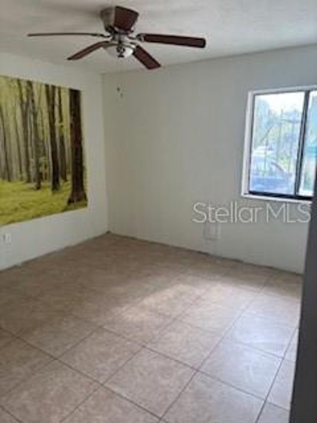 Photo of 4307 Continental Boulevard, Orlando, FL 32808 (MLS # O6375962)