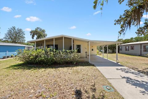 104 WINTERBERRY AVENUE WILDWOOD FL 34785