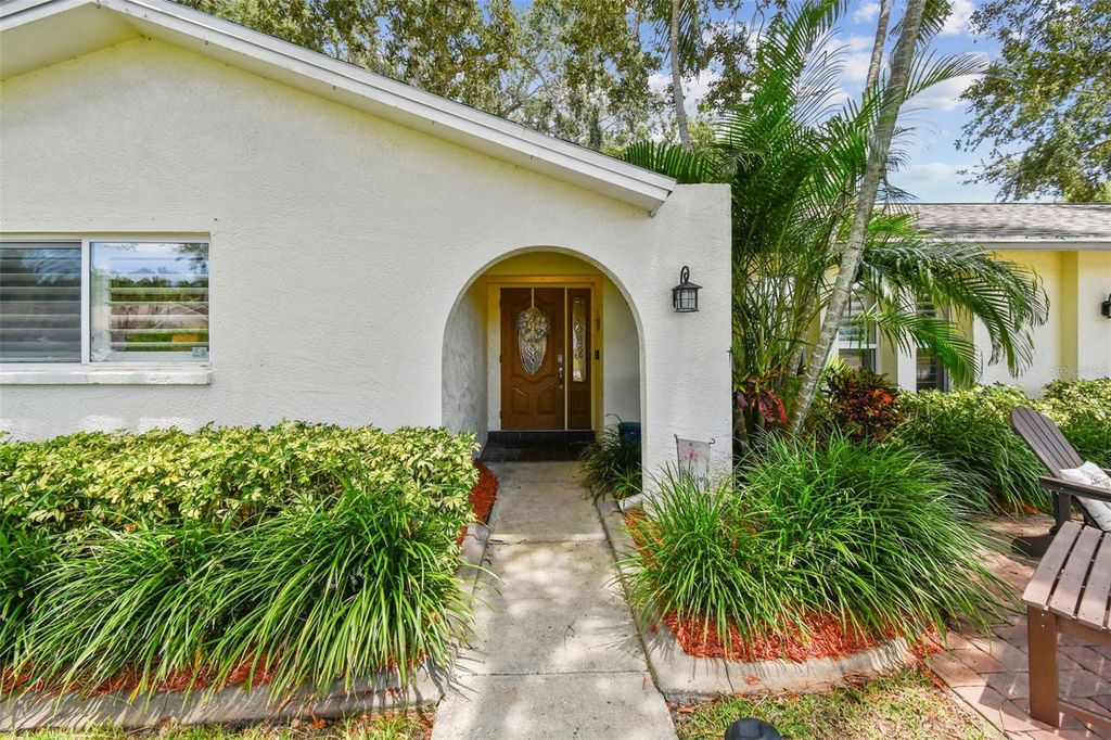 Photo of 12801 Kimberly Oaks Circle, Largo, FL 33774 (MLS # TB8416607)