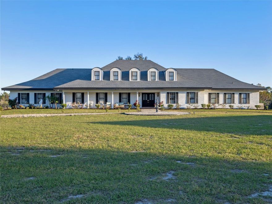 Discover a rare opportunity to own this stunning almost 20-acre estate in the heart of Oviedo, FL—fully turnkey, income-producing potential, gem nestled in peaceful Oviedo, just minutes from Winter Park, UCF, and major highways and airports, while still offering convenient access to Central Florida’s world-renowned theme parks like Disney World and Universal Studios—just a reasonable drive away for day trips or visiting guests. Zoned agricultural with FLU designation for future residential development, this property offers unmatched flexibility with NO HOA or deed restrictions. The spacious 5-bedroom, 4.5-bath Farmhouse-style main home spans 5,737 sqft and features grand living spaces, two Florida rooms, game rooms, a spa room, and a brand-new saltwater pool, perfect for relaxation or guest enjoyment. It has served as a fully operational and turnkey business that includes a lodging and event venue establishment, and was licensed on Airbnb with a Superhost status, but can be used as a private estate, agritourism business or Bed and Breakfast. This operational farm stay includes over 4000 mature blueberry bushes, cattle, farm equipment and more. The property also includes a generous three-car garage, a versatile red room that is perfect for a wine room or storage. Let's not forget the newly constructed 2,400 sq ft event barn that is ideal for weddings, retreats, or future expansion. Whether you're seeking a private retreat, event venue, or long-term investment, this one-of-a-kind property offers beauty, tranquility, and strong income potential—fully furnished and ready to go. Whether you aspire to expand the existing agritourism business or explore new ventures in the vibrant agricultural industry, this property is an unparalleled opportunity to turn your dreams into reality. Unleash your vision, creativity, and entrepreneurial spirit to transform it into a haven of happiness and lucrative income-generating ventures. Seller financing available with no payments due the first two years.