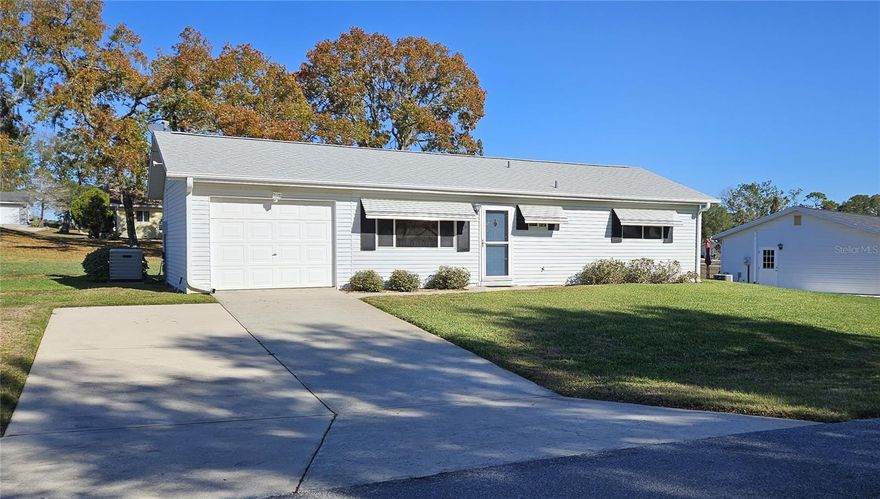 This property features a two-bedroom, two-bathroom layout with a one-car garage. The roof was replaced in 2025, and the air conditioning unit was installed in 2008. It includes an irrigation system and a water softening system.
Located within a 24-hour gated 55+ community, the property benefits from a low management fee. Residents have access to various amenities, which include planned social events, a library, billiards, a card room, an arts and crafts room, a community pool, and a tennis court. The low management fee covers trash removal, 24-hour guarded gate access, maintenance of common areas, and use of the clubhouse facilities. Golf carts are permitted, and RV/boat storage may be available for a modest monthly fee. 
Conveniently situated in Southwest Ocala, the property is just a short distance from shopping, restaurants, VA hospitals, and other healthcare facilities. Additionally, the property is only minutes from I-75, one hour from Gainesville, and one and a half hours from Orlando.
The clubhouse has a new roof and tennis court has recently been resurfaced. Clubhouse has a new roof and tennis court has recently been resurfaced.