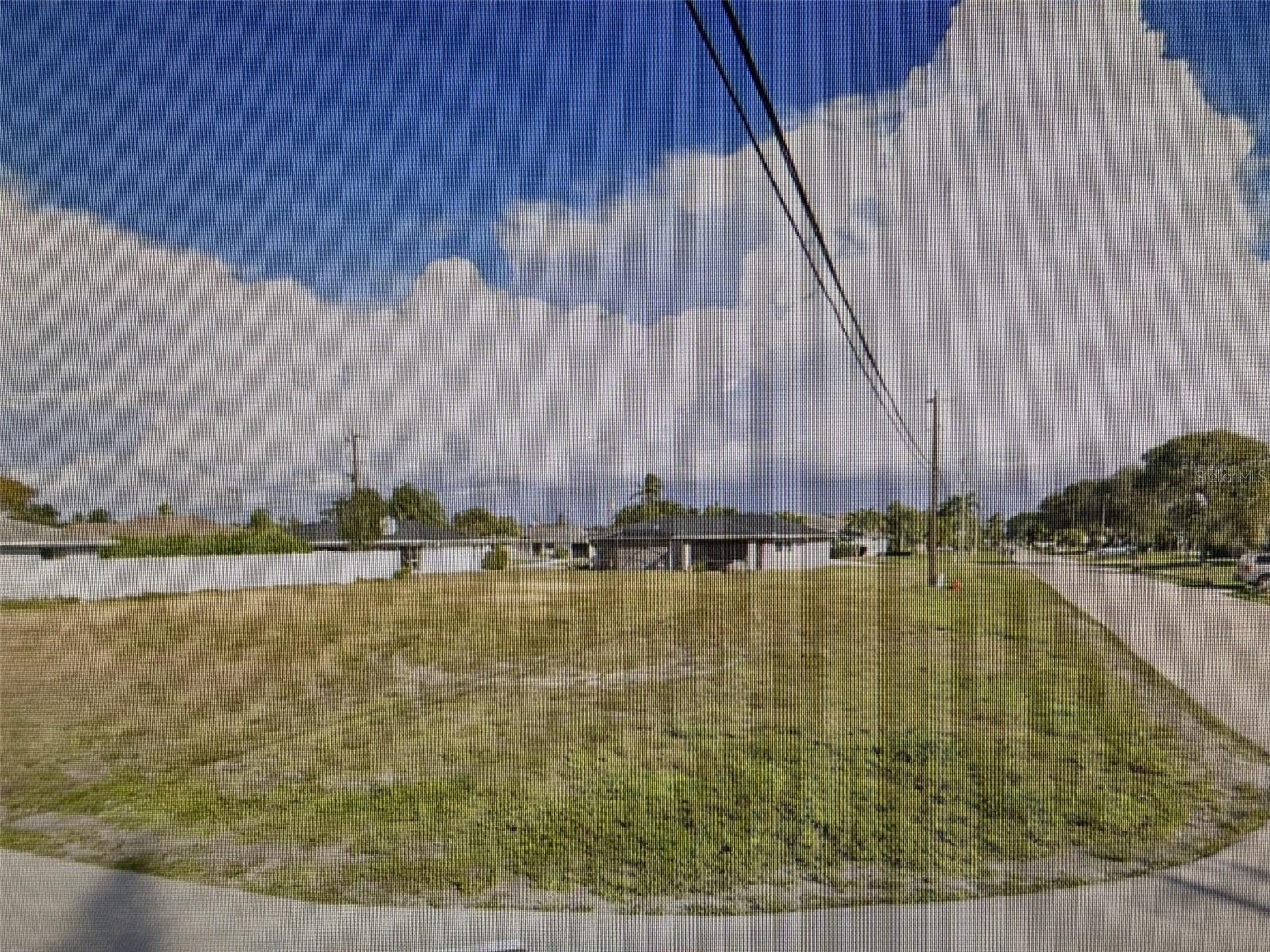BEAUTIFUL CORNER LOT. One of the best priced properties in South Cape Coral with all assessments paid. Oversized, cleared.....put this one on the list to see!