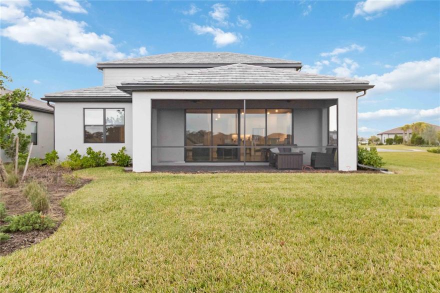 Luxury finishes, preserve serenity, and resort living — all 5 miles from the beach.
Wake up to peaceful preserve views and spend your evenings relaxing in private with no rear neighbors, just the natural beauty of Talon Preserve right outside your pocket sliding glass doors.
Built in 2023, this stunning Whitestone model sits on an oversized lot and comes loaded with over $115,000 in builder upgrades — worth even more today. Every detail was chosen with intention: a chef's kitchen featuring built-in appliances, gas range, quartz countertops, custom solid wood soft-close cabinetry with double pull-out shelves, under-cabinet lighting, and a large island with extra storage. The great room flows seamlessly to the covered outdoor space — effortless for entertaining or simply unwinding in privacy.
The main-floor primary suite offers the accessibility and privacy you deserve, complete with a spa-style walk-in shower, double sinks, and a custom walk-in closet. Upstairs, a spacious loft anchors three additional bedrooms — plus a private fourth bedroom with its own ensuite, perfect for guests or multigenerational living.
Thoughtful upgrades continue throughout: new laundry room and closet storage systems, top-down/bottom-up blinds, all-new ceiling fans, epoxy garage floors with overhead storage, a widened driveway, 4-foot garage extension, tray ceilings, floor-to-ceiling tile, and a tankless water heater. Smart home features include a Ring doorbell, smart front lock, and Ecobee thermostat. For added peace of mind — this home is NOT in a flood zone and includes hurricane shutters.
Beyond the home, the lifestyle is unmatched. NO CDD fees. Direct community access to the Legacy Trail gives you 18+ miles of multi-use path. The resort-style amenities — 18,000 sq ft clubhouse, pool and hot tub, state-of-the-art fitness center, pickleball and tennis courts, bocce, splash pad, dog park, arcade, bar, restaurant, and more — mean you may never want to leave. And when you do, you're just 5 miles from the nearest beach, minutes from downtown Venice, Oscar Scherer State Park, I-75, top-rated schools, and Sarasota Memorial Hospital.

Gated with a guard, NO CDD fees, and HOA covering irrigation, landscaping, and maintenance. Skip the wait and the stress of building — this move-in-ready home is everything you've been looking for, available now.

This property qualifies for a Lender Credit of 1 Discount Point toward closing costs or rate buydown with preferred lender — ask for details