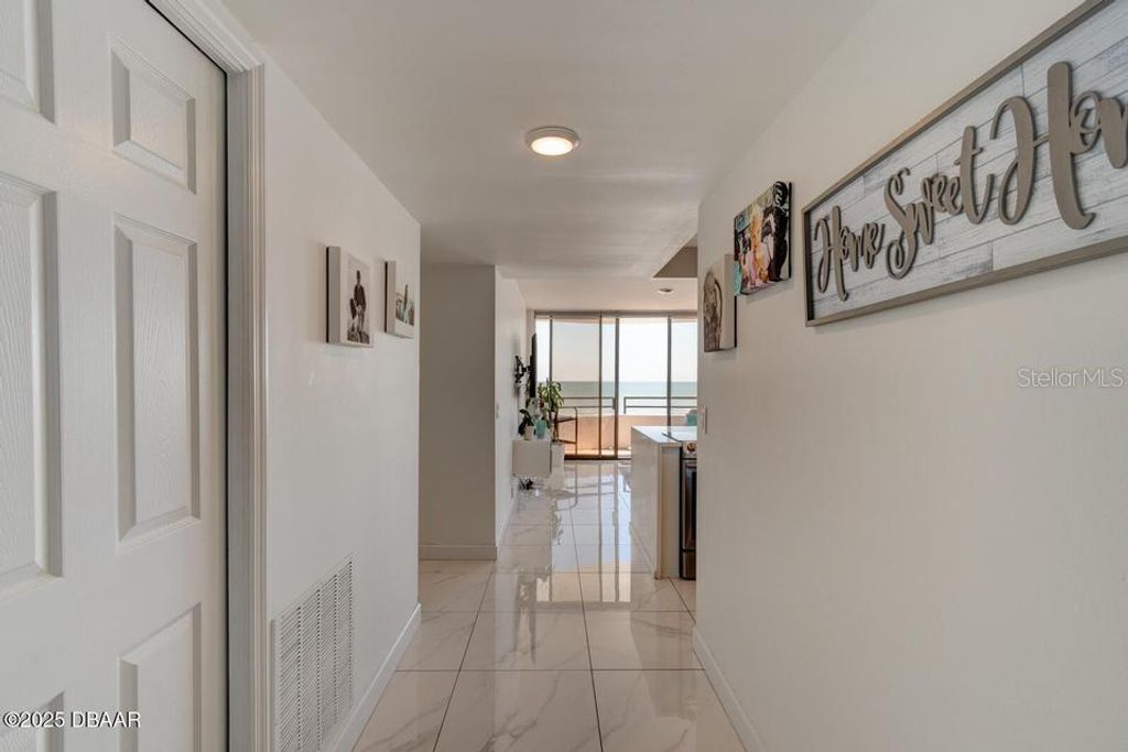 Photo of 2828 N Atlantic Avenue #302, Daytona Beach, FL 32118 (MLS # V4948501)