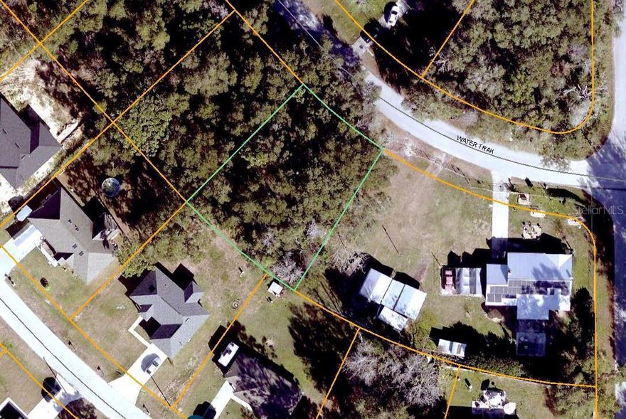 Nicely wooded lot in the Silver Springs Shores area of Ocala! NO HOA and you choose the builder. 77 ft of paved road frontage. Located close to shopping, dining and entertainment. A great residential location.