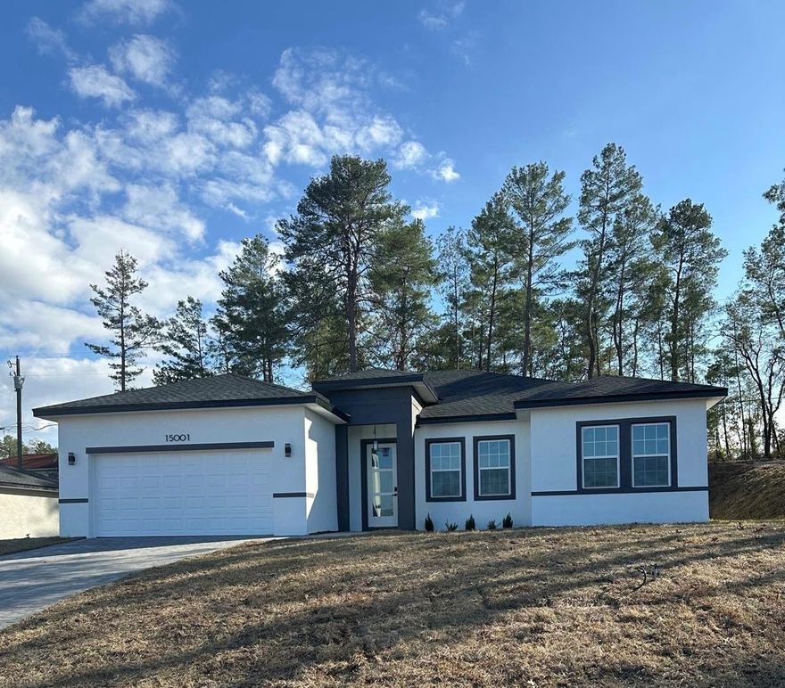 Experience modern living in this newly built 4-bedroom, 3-bath home thoughtfully designed for comfort, functionality, and privacy. Every detail reflects carefully selected upgrades, the builder truly invested in elevated finishes throughout.

Situated on an oversized lot with permanent open space behind it, this property offers rare privacy with no rear neighbors and additional outdoor space to enjoy.

The floor plan is exceptionally versatile, featuring a dual-suite configuration ideal for multigenerational living. The primary suite is generously sized and includes his-and-hers walk-in closets. In addition, the home offers a secondary suite along with a Jack-and-Jill layout, providing flexibility for guests, extended family, or growing households.

Inside, you’ll find luxury vinyl flooring throughout, soaring ceilings, and a seamless open-concept design connecting the living, dining, and kitchen areas — perfect for both everyday living and entertaining.

The kitchen stands out with quartz countertops and a full suite of stainless steel appliances, including refrigerator, electric range, microwave, and dishwasher — making this home truly move-in ready.

The location is another standout feature. Positioned in the desirable community of Marion Oaks, the property enjoys a privileged setting less than one mile from Sunrise Elementary School and Horizon Academy, while also offering convenient access to shopping and quick connectivity to Interstate 75. It truly combines peaceful surroundings with everyday convenience.

Homes offering this combination of space, thoughtful design, privacy, and prime location are increasingly hard to find.