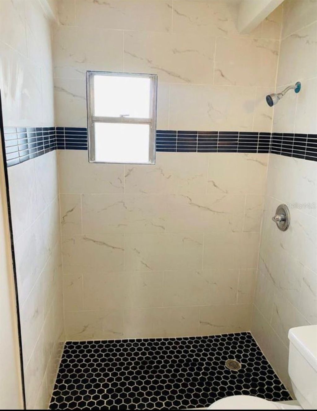 Photo of 3207 Clifford Sample Drive, Tampa, FL 33619 (MLS # TB8529904)