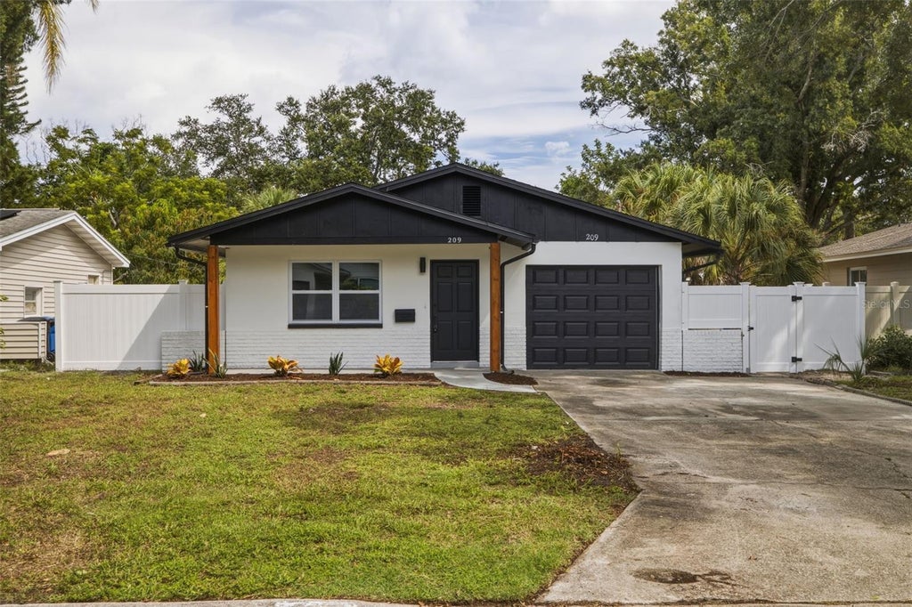 Photo of 209 SE Monroe Circle N, St Petersburg, FL 33703 (MLS # TB8545658)