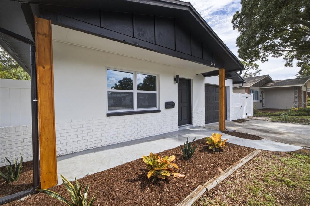 Photo of 209 SE Monroe Circle N, St Petersburg, FL 33703 (MLS # TB8545658)