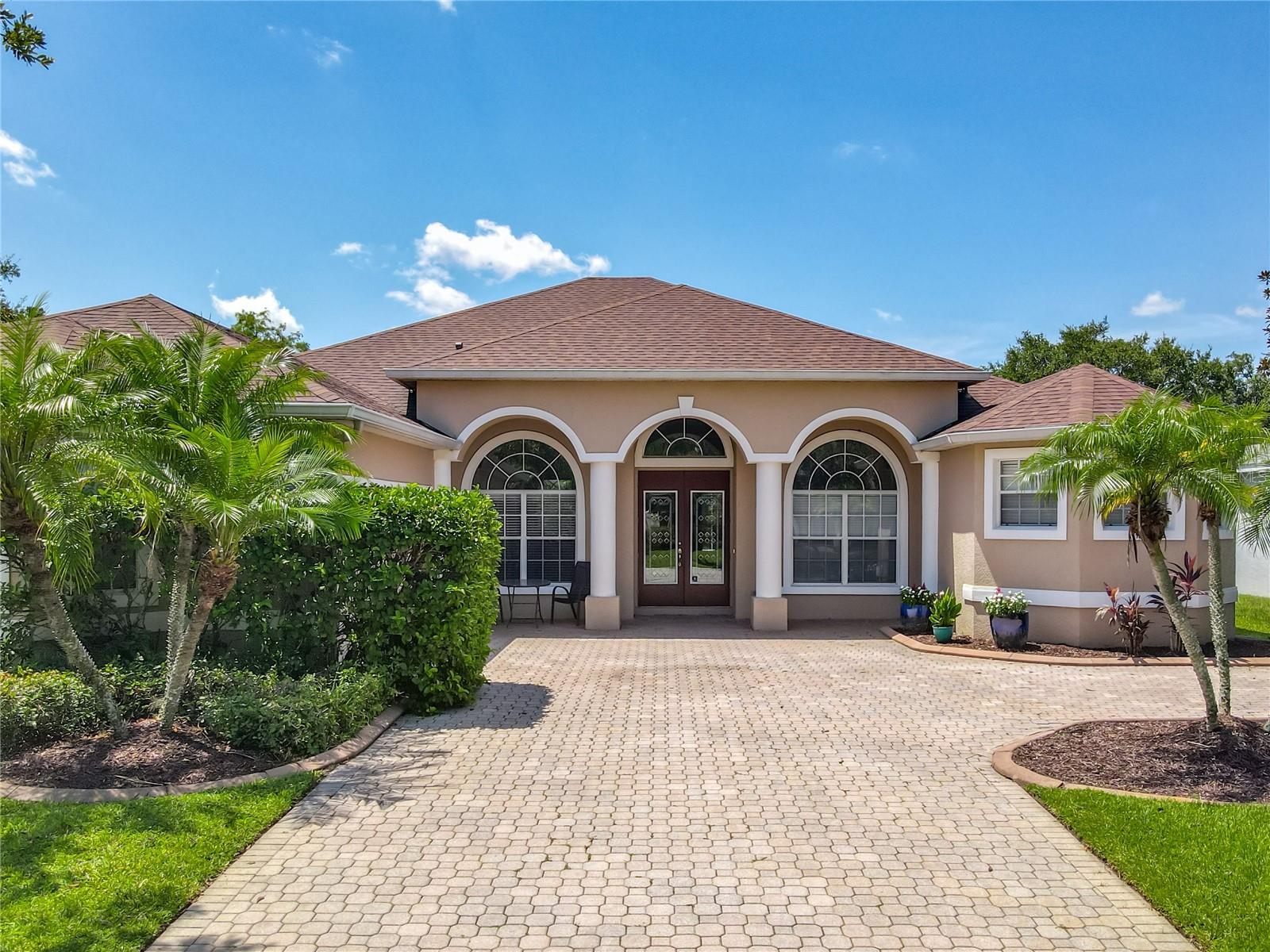 This stunning 5-bedroom, 3-bathroom home in Orlando, FL, offers an exceptional blend of comfort and elegance. The Roof was recently replaced in 2021, the pool pump in 2022, and the pool was resurfaced in 2023. Step inside to discover soaring high ceilings and exquisite crown molding throughout, creating an airy and luxurious ambiance. The kitchen features gleaming granite countertops, stainless steel appliances, and ample cabinet space. A beautiful set of French double doors welcomes you into this magnificent residence. Retreat to the spacious master suite, complete with a luxurious garden tub and a large walk-in shower, offering a spa-like experience. Outside, enjoy the Florida sunshine in your private, screened-in pool, perfect for relaxation and entertaining. This home is truly a must-see!