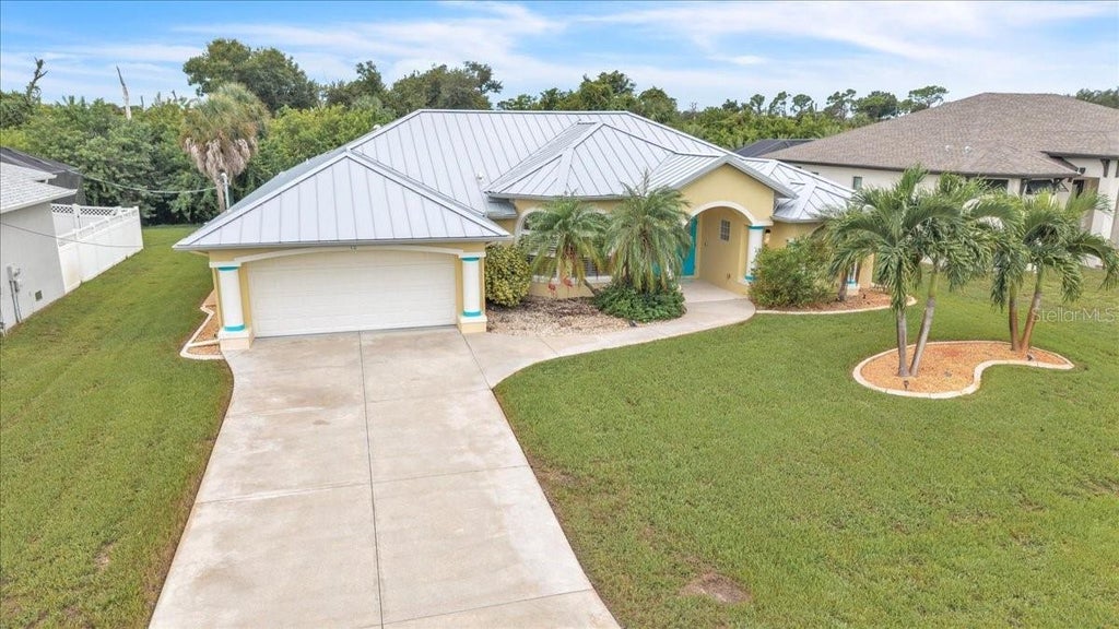 Photo of 12 Tournament Road, Rotonda West, FL 33947 (MLS # C7531575)