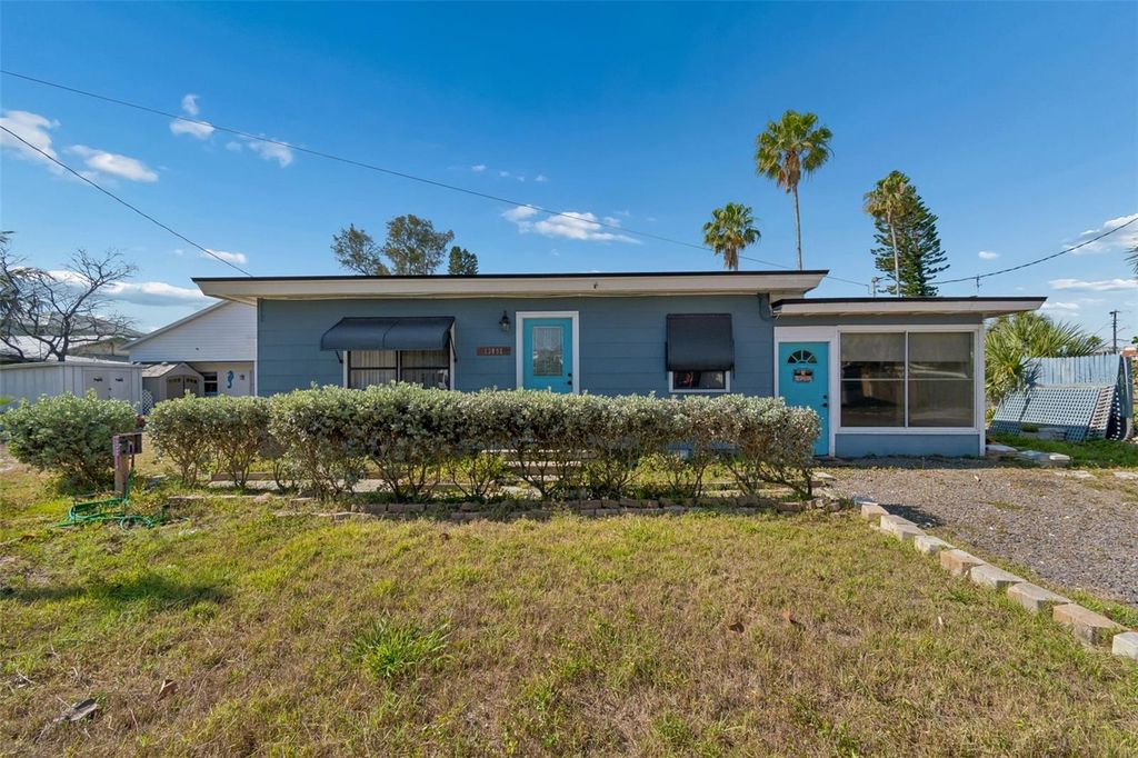 Photo of 13098 Boca Ciega Avenue, Madeira Beach, FL 33708 (MLS # TB8496257)