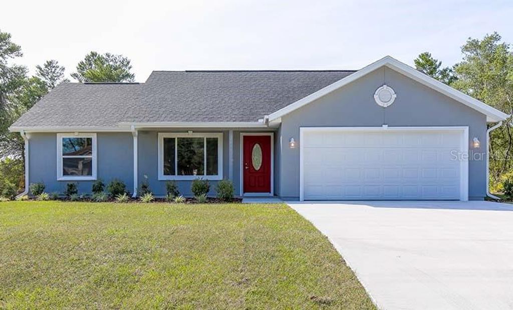 Photo of 5058 SW 154th Loop, Ocala, FL 34473 (MLS # O6356544)