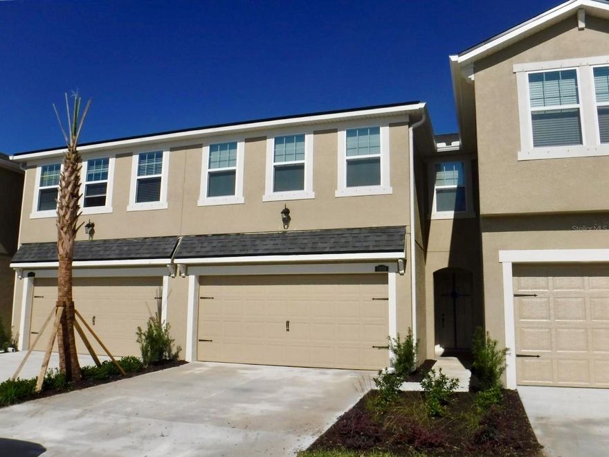 Welcome to this beautifully maintained 3-bedroom, 2.5-bath townhome located in the highly desirable Boyette Park community. Designed for comfortable Florida living, the home features tile flooring throughout the main living areas with plush carpeting in the bedrooms. The spacious kitchen offers abundant cabinetry, stainless steel appliances, and a large island that opens seamlessly to the living area—ideal for entertaining. Additional highlights include convenient under-stair storage and a 2-car garage for added functionality. Step outside to enjoy peaceful mornings or evenings on your private patio. Boyette Park residents enjoy resort-style amenities including a community pool, playground, and dog park, all while being just minutes from shopping, dining, and everyday conveniences. Schedule your private showing today.