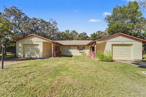 Photo of 1443 Giles Avenue, Spring Hill, FL 34608 (MLS # TB8561336)