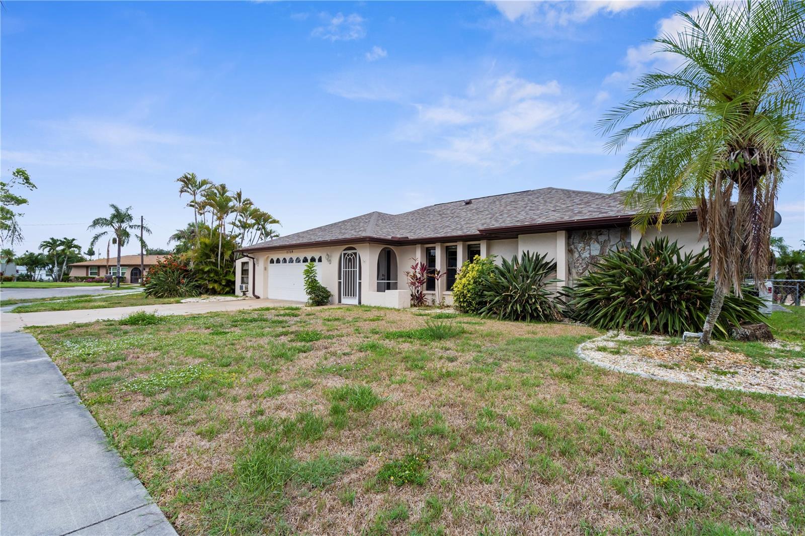 Gulf Access Waterfront Retreat | No Bridges | Sailboat Access | Never Flooded
Welcome to your dream waterfront oasis in the heart of North Fort Myers, perfectly situated on a peaceful cul-de-sac with sailboat access and no bridges to the Gulf—just 10 minutes to open water!
This hurricane-resilient home has never flooded, even through the last three major hurricanes, making it a rare and secure find in this area.
?? Property Highlights:
New Roof (2023) | Freshly Painted Inside & Out (2023)
New Irrigation Pump (2022) | UV Light for A/C System (2023)
Main Home A/C (2013) | Garage A/C (2023) | Climate-Controlled Storage Room
Dock Painted & Sealed (2024) | Pool Heater (2017)
90-Foot Boat Dock with Water & Electricity | Deep Water Access
No Bridges to the Gulf – Ideal for Larger Boats & Sailboats
Fully Fenced Dog Run | Mature Mango Tree
Oversized Air-Conditioned Garage + Separate A/C Storage Room
?? Outdoor Living at Its Best
Relax or entertain year-round in the expansive screened lanai, featuring:
A 22-ft wide covered patio area, Heated Pool with waterfall & Jacuzzi Spa, Outdoor Kitchen Space, all set against a stunning waterfront backdrop.
??? Interior Features
Step inside to an open-concept layout that seamlessly connects:
Living Room, Dining Area, inside laundry, Kitchen with tiled countertops, panoramic pool & water views
Second Family Room for extra space
The home features:
3 Bedrooms, each with Walk-In Closets
2 Full Bathrooms, including a luxurious waterfront master suite
?? Prime Location
Conveniently located near:
Shopping & Dining, Caloosahatchee River, Short boat ride to the Gulf of AMERICA!!
Perfect for boating enthusiasts, entertainers, and those seeking tranquil waterfront living with peace of mind in any weather.