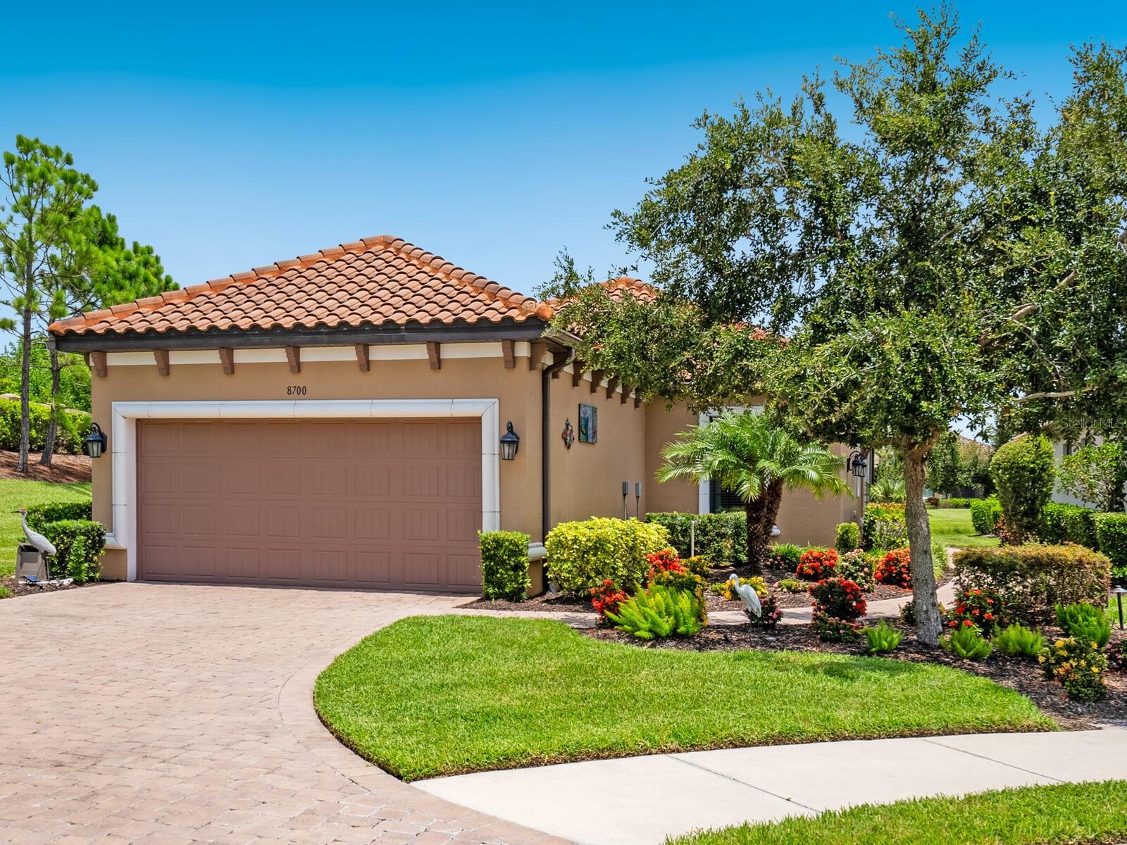 Situated in the gated community of Cobblestone on Palmer Ranch in Sarasota, Florida, this waterfront beauty has been impeccably maintained by the original owners. This prime location at the end of a cul-de-sac offers two-bedrooms, two-baths with an office which could be a third bedroom and a separate dining area. This homes bright open floor plan, and spacious kitchen with breakfast bar lead to the lanai overlooking the pond. The split plan home offers a luxurious primary suite with lake views and a second bedroom that is en-suite as well. The extended screened lanai offers serene views of the pond, perfect for entertaining and outdoor living. Additional highlights include a private larger-than-average lot ensuring privacy and an oversized two-car garage. Cobblestone on Palmer Ranch is a gated community with excellent amenities, including a beautiful clubhouse with workout facilities, game room, pool with spa, dog park, playground, and pickleball courts. Truly a gem, this vibrant community is just 5 miles to Siesta Key Beach's and 7 miles to downtown Sarasota. This home, in this community, is the answer to your Florida lifestyle dreams.