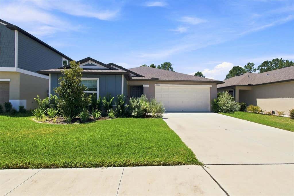 Photo of 34701 Rainville Loop, Zephyrhills, FL 33541 (MLS # TB8538101)