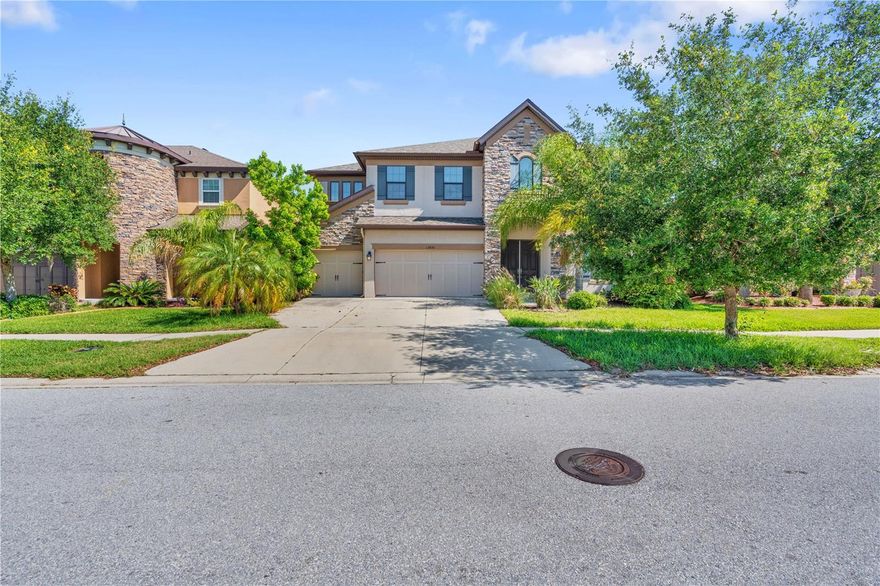 Welcome to this exceptional 5-bedroom (including 2 Primary Suites), 5-bathroom home with a 3-car garage located in the gated community of Reserve at South Fork. Offering an impressive amount of space and flexibility, this home is ideal for multigenerational living, large households, or those needing extra room for work and play. Step inside to a bright, open floor plan featuring soaring ceilings and abundant natural light. Downstairs you will find a gourmet kitchen complete with ample cabinetry, quartz counters, large island, huge walk-in pantry, and an eat-in dining area—perfect for both everyday living and entertaining. The kitchen overlooks the living room and there is a separate dining room. The office is also downstairs along with a bathroom and one of the Primary suites with a huge walk-in closet and en-suite bath with dual sinks. Upstairs you will find another primary suite which provides a private retreat with a balcony, large walk-in closet and an ensuite bath featuring dual sinks, a soaking tub, and a separate walk-in shower. 3 additional bedrooms are upstairs along with a loft, bonus room, and 3 additional bathrooms. Enjoy outdoor living in the fully fenced backyard, offering privacy and plenty of space for pets, play, or future outdoor enhancements. With five bedrooms plus additional rooms and spaces, there’s incredible versatility for guest suites, or hobby spaces. Located within a secure gated community, residents of South Fork enjoy amenities including a pool, playground, walking trails and much more!. Conveniently situated near shopping, dining, schools, and major highways, with an easy commute to Tampa and surrounding areas. Opportunities like this—combining size, location, and value—don’t come often. Schedule your private showing today!