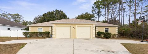 Photo of 18 Regina Lane #A & B, Palm Coast, FL 32164 (MLS # FC316662)
